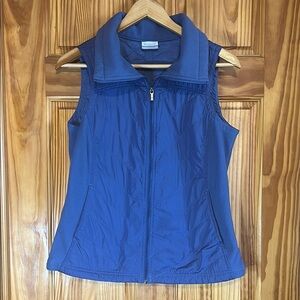 Columbia Zip-Up Vest. Bluish purple in color.